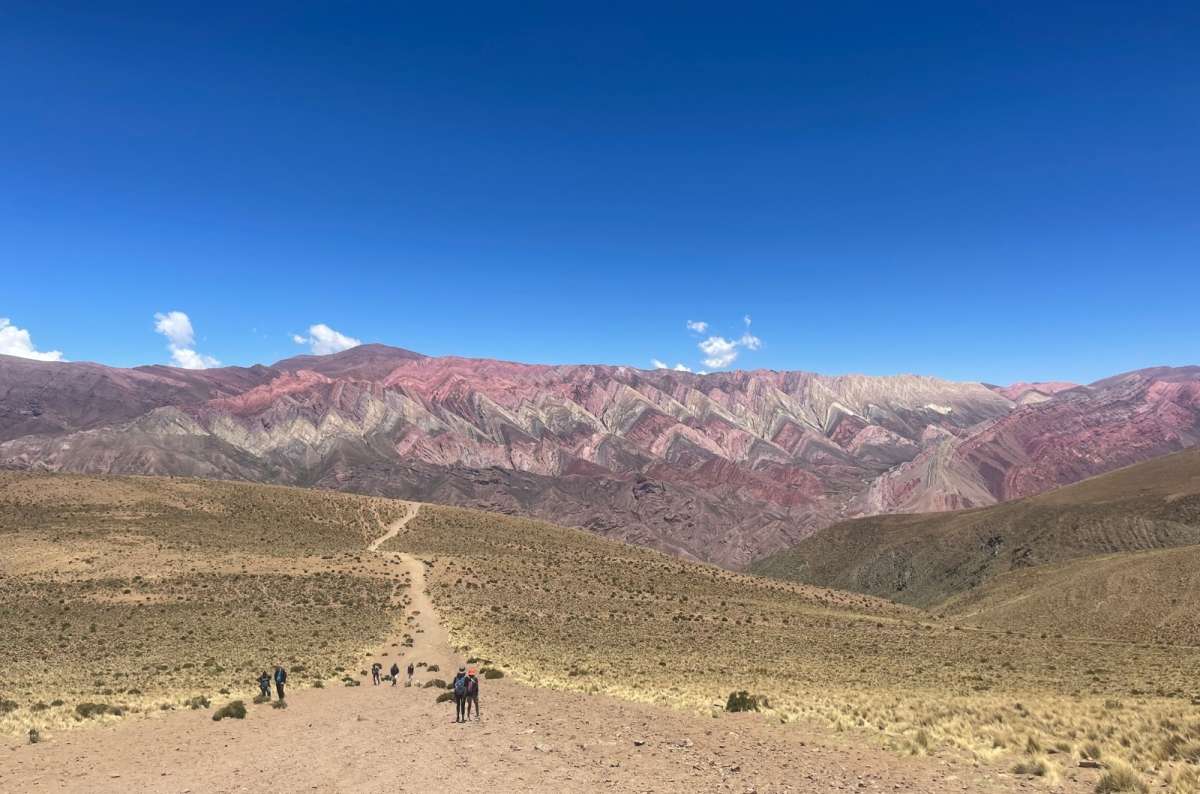 Cerro de los 14 Colores in northern Argentina, featuring vivid multicolored mountain layers, photo by Next Level of Travel