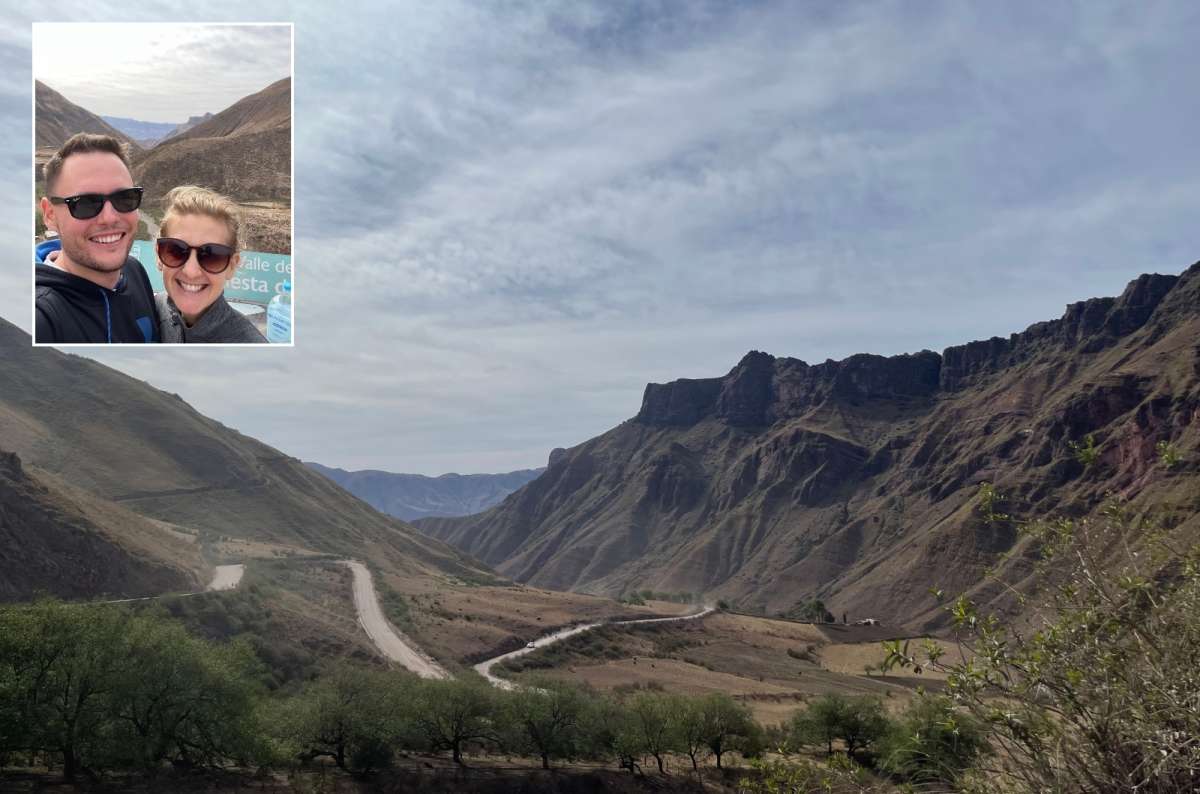 Mountain landscape with a tourist couple at Cuesta del obispo, two weeks in Argentina,  photo by Next Level of Travel