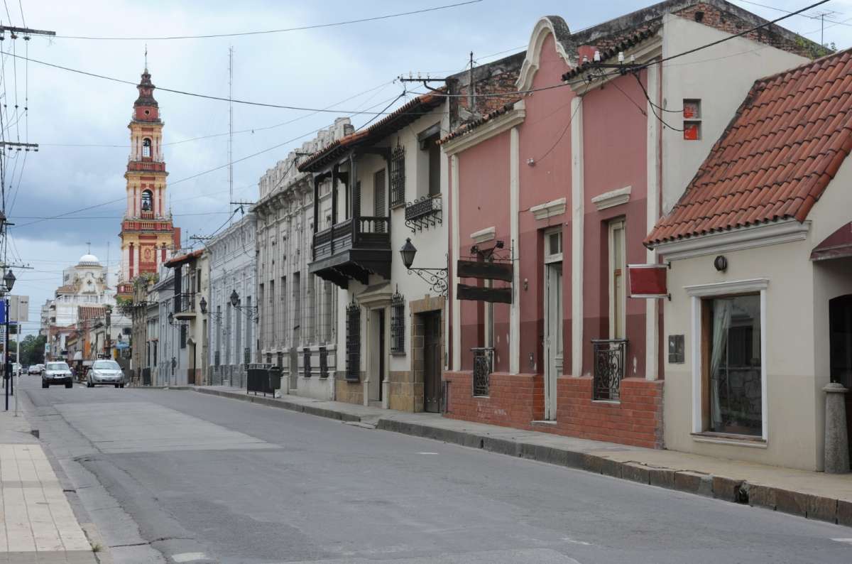Quiet street in Salta, Argentina, lined with colonial-style buildings