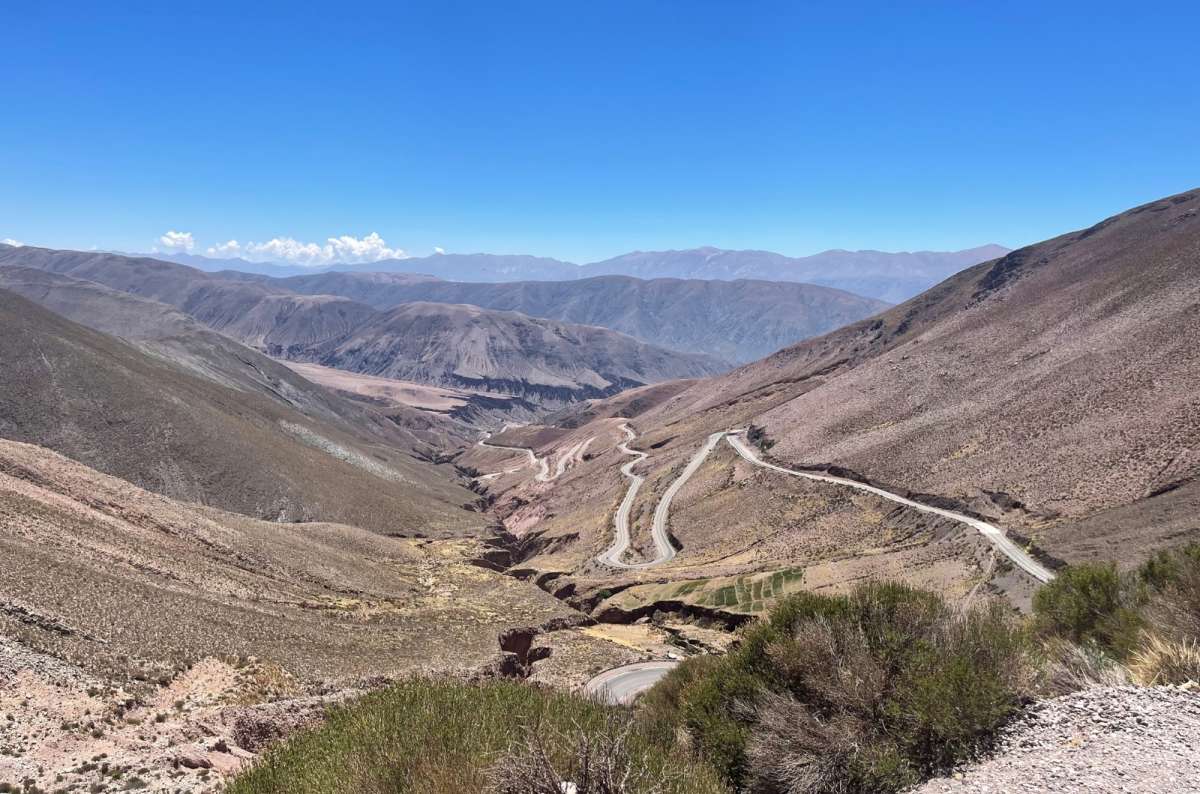 Winding mountain road leading toward Salinas Grandes, driving through Argentina, photo by Next Level of Travel