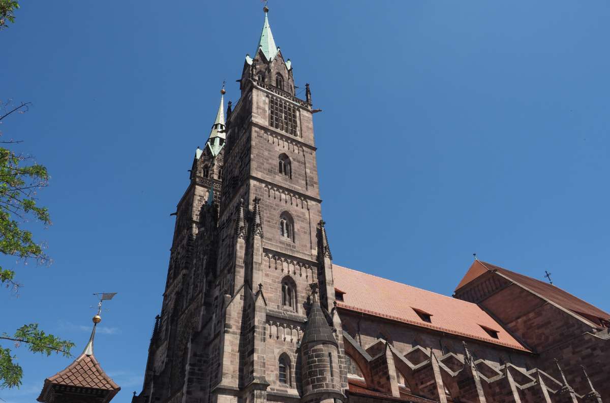 a photo of the towers of St. Lorenz Church in Nuremberg, Germany