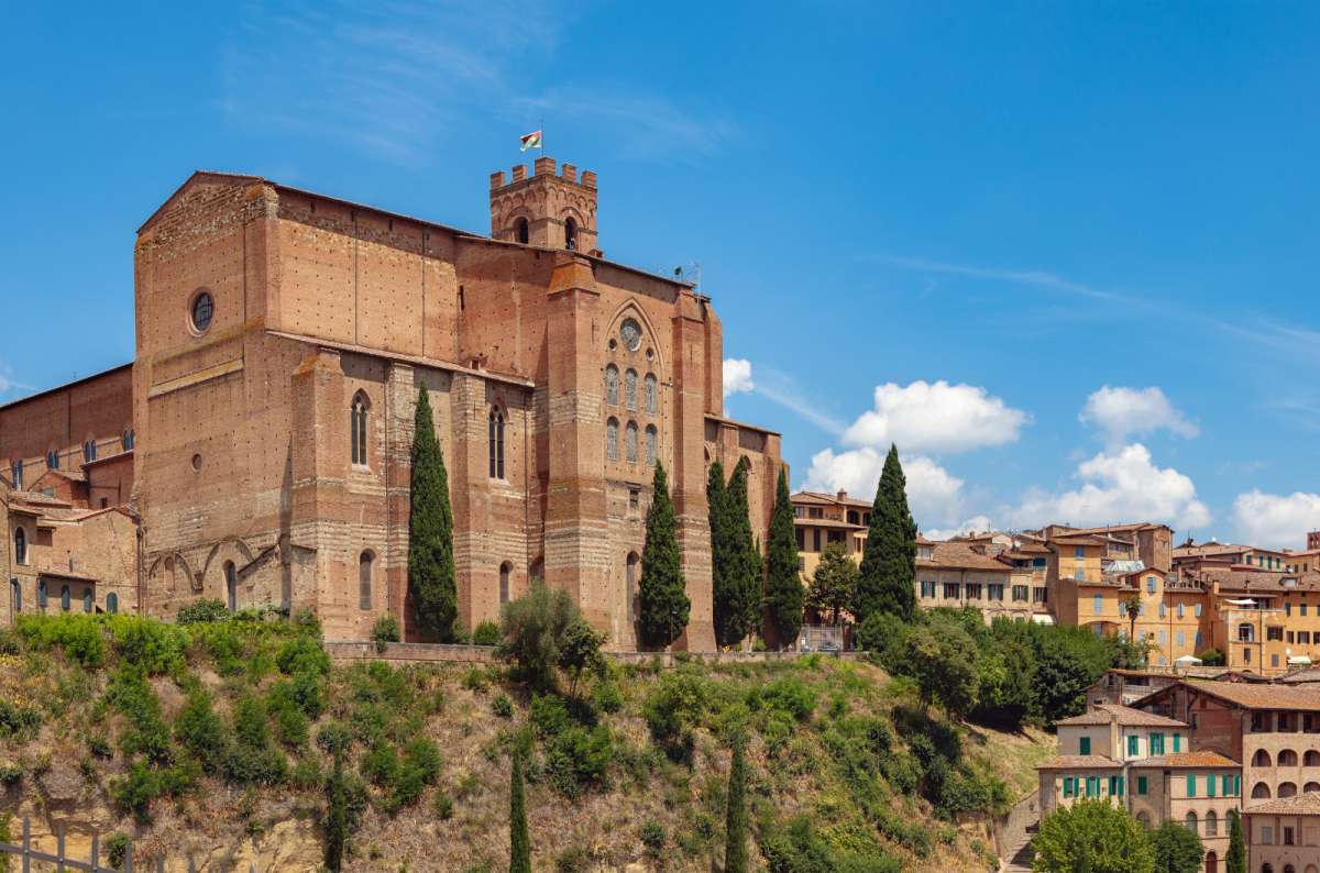 a photo of Basilica Cateriniana San Domenico woth a slight view of the surrounding area, Siena, Italy