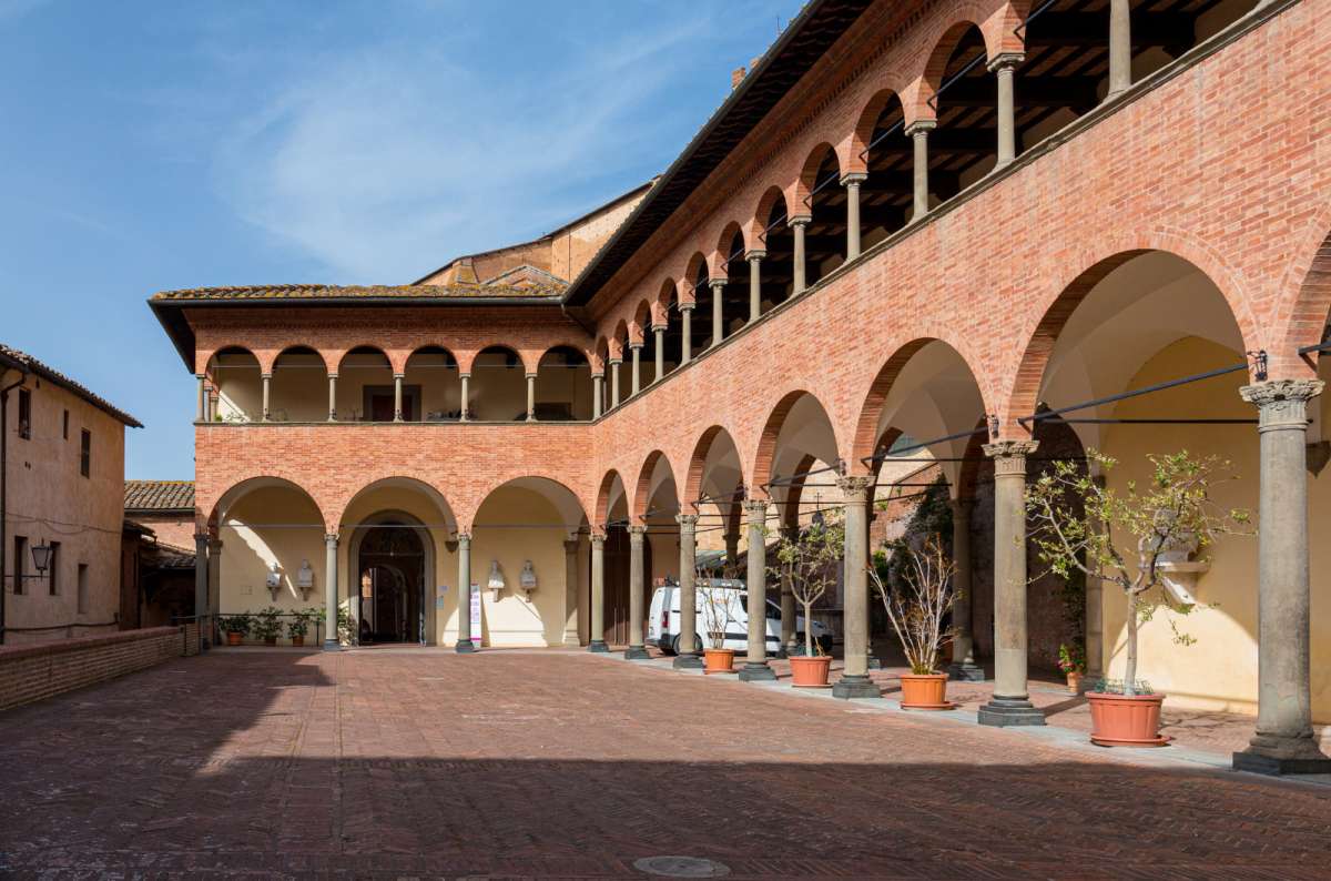 a photo of the outside of the Sanctuary of Saint Catherine of Siena, Italy