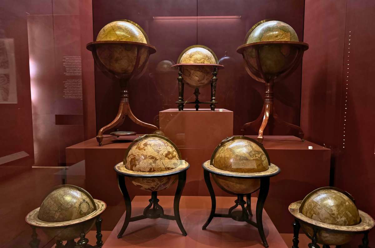 Collection of antique globes displayed in Museo Galileo in Florence, Italy, photo by Next Level of Travel