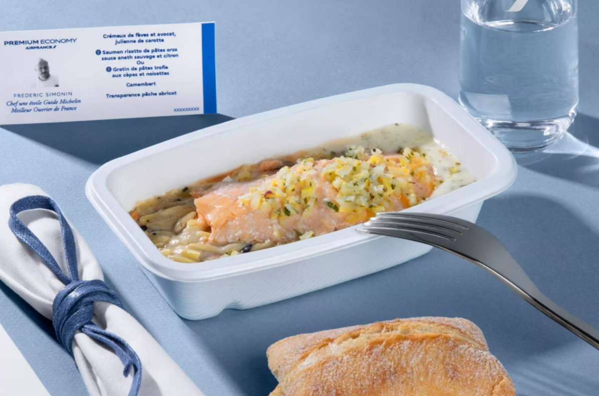 Premium Economy meal by Air France featuring salmon risotto with orzo pasta and lemon-dill sauce