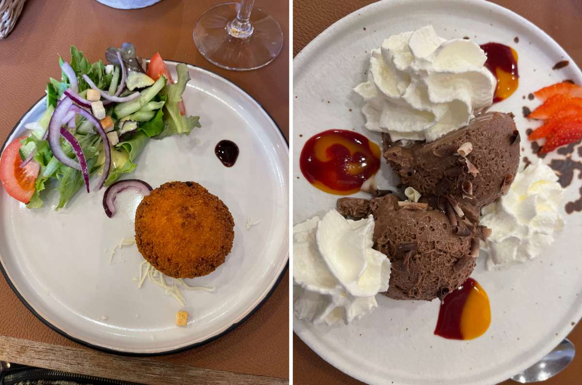 Cheese croquette with fresh salad and Belgian chocolate mousse dessert on white plates, photo by Next Level of Travel