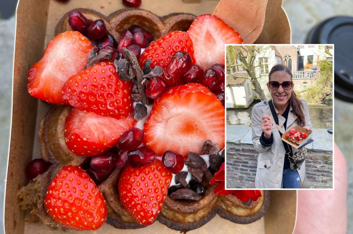 Waffle topped with strawberries and pomegranate from Otto Waffle Atelier, one of the top 10 things to do in Bruges, photo by Next Level of Travel