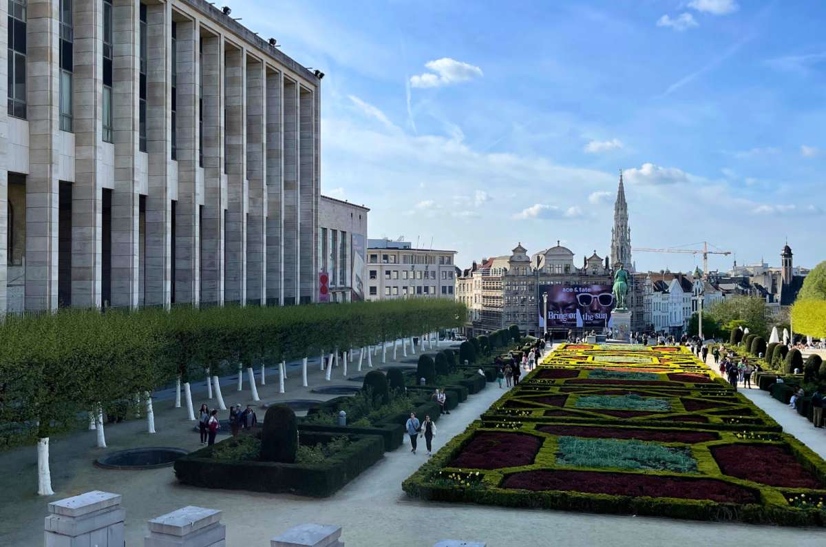 Mont des Arts gardens with view towards Brussels Town Hall, Belgium, taken on a sunny spring day, photo by Next Level of Travel