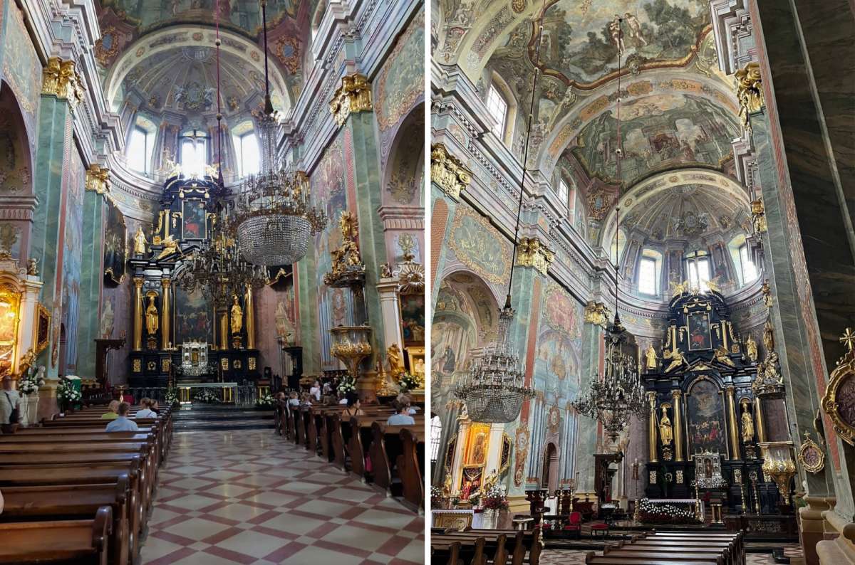 a photo of the inside of the Basilica of St. John displaying the intricate decorations accenting the black altar, Lublin, Poland