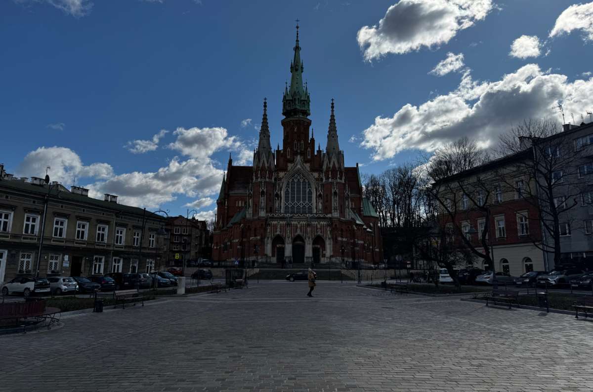 a photo of the Kazimierz quarter with St. Joseph’s church visible in the background, Krakow, Poland, photo by Next Level of Travel