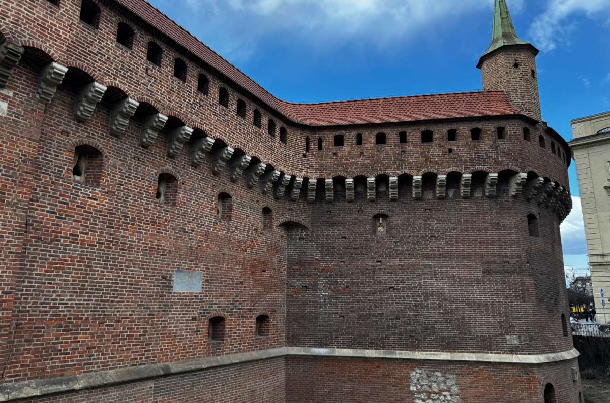 a photo of the outside of the Barbican, Krakow, Poland, photo by Next Level of Travel Given the side of the Barbican, its gravitational pull should be strong enough for you to come take a look