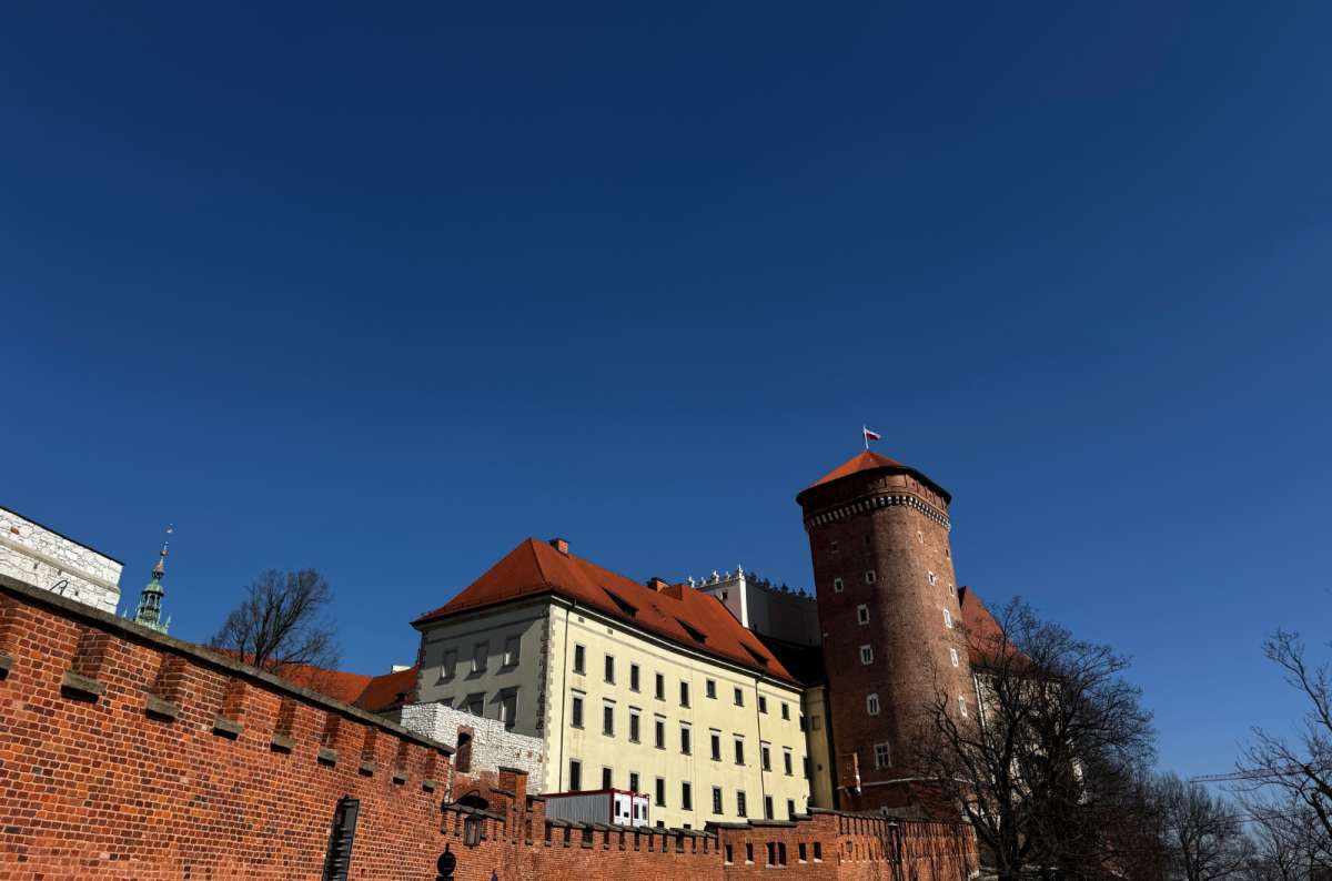 a photo of the Wawel castle with showing the mixture of various architectural styles, Krakow, Poland, photo by Next Level of Travel