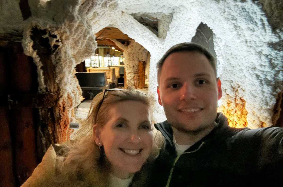a photo of a tourist couple posing at the Wieliczka Salt Mine, Poland, photo by Next Level of Travel