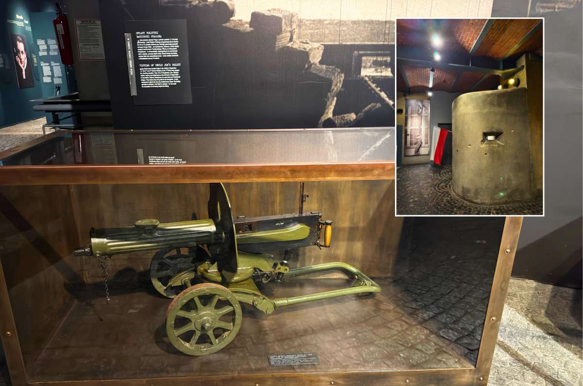 Exhibit inside the Warsaw Uprising Museum in Warsaw, Poland showing a preserved Soviet Maxim machine gun on wheels and a concrete bunker replica, photo by Next Level of Travel