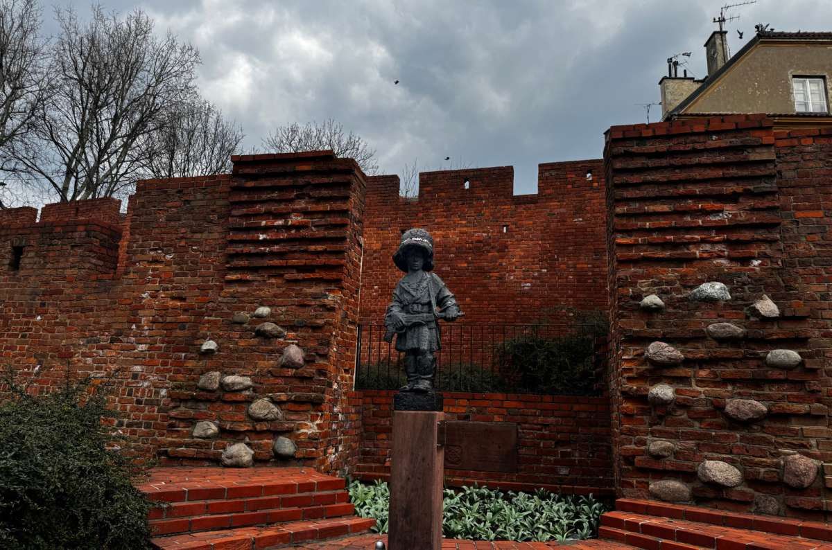 Mały Powstaniec (Little Insurgent) monument in Warsaw, Poland, photo by Next Level of Travel
