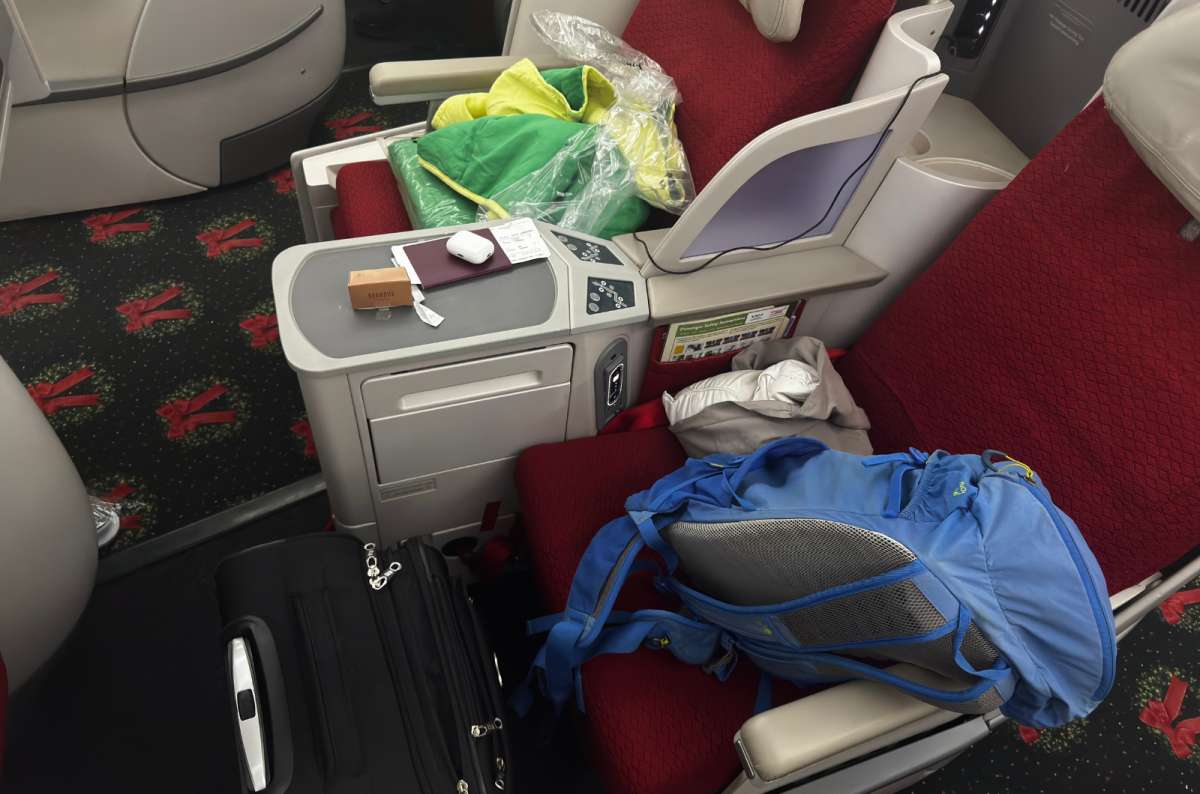 a photo from inside of the Ethiopian Airlines Business Class Dreamliner flight showing a view of the seats from above, photo by Next Level of Travel