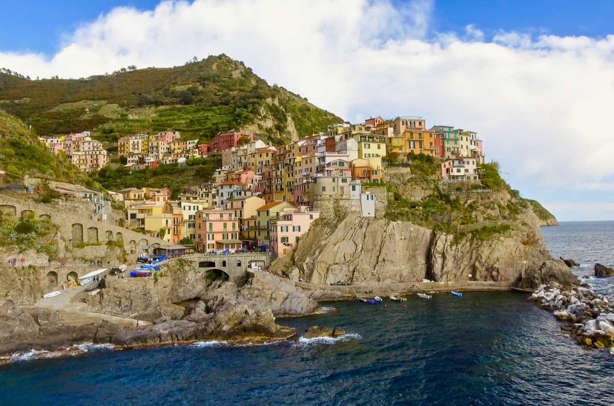 Colorful cliffside houses in Manarola, Cinque Terre, Italy overlooking the Ligurian Sea