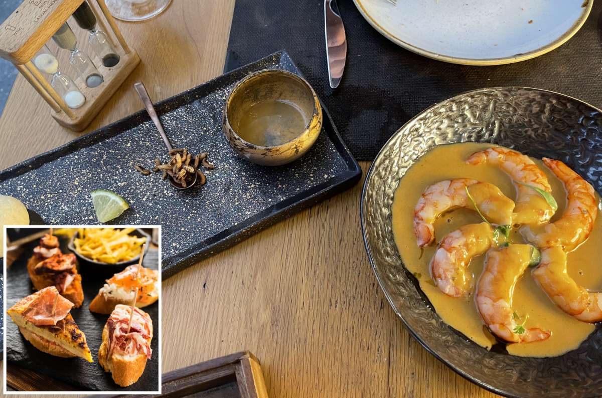 Spanish tapas with cured ham and cheese served at a traditional restaurant table, Andalusia, Spain, photo by Next Level of Travel 