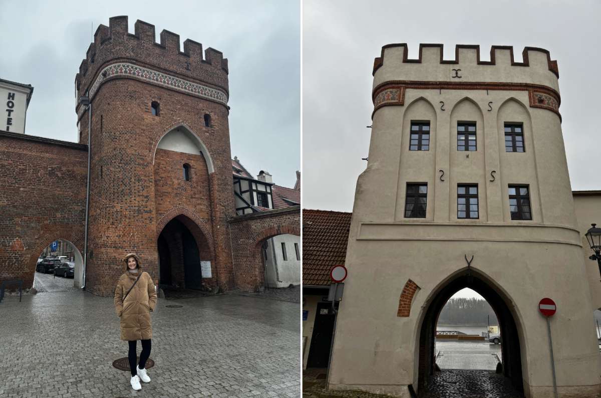 Red brick medievalgate and white Mostowa Gate leading toward the Vistula River in Toruń, Poland, photo by Next Level of Travel