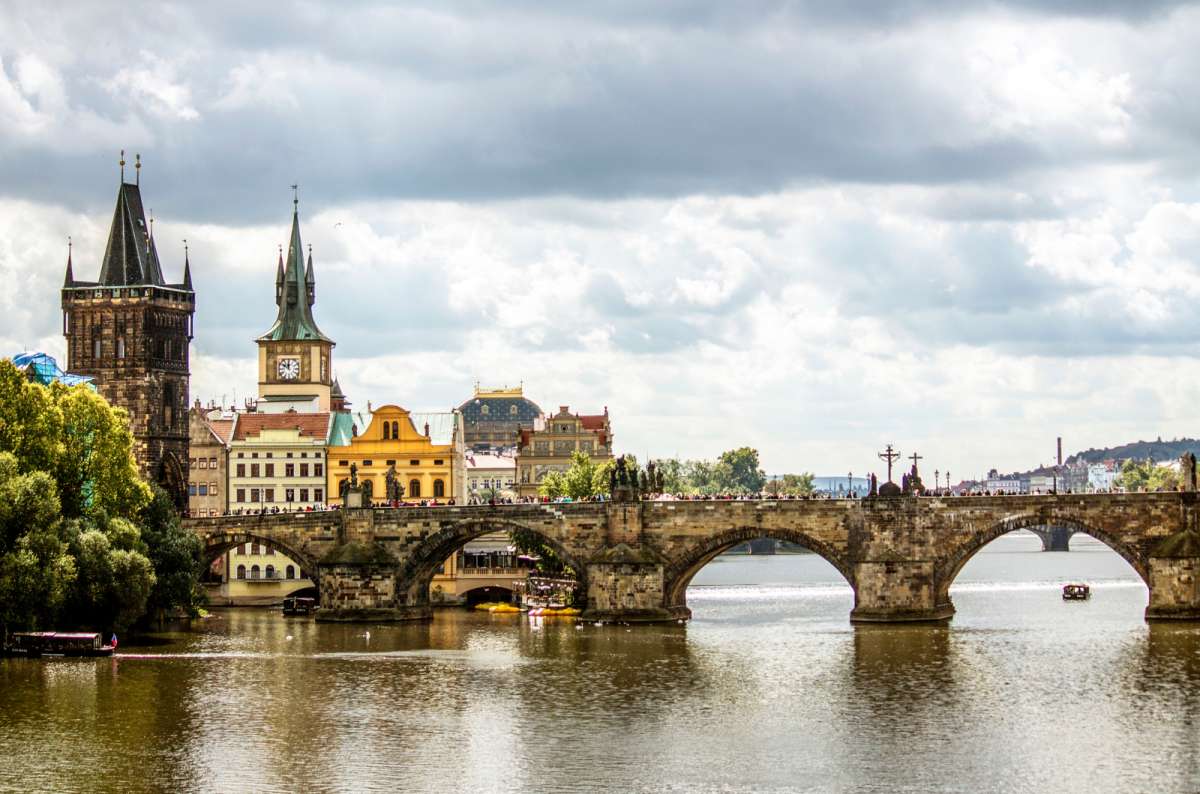 Charles Bridge over the Vltava River with Old Town Bridge Tower in Prague, Czech Republic
