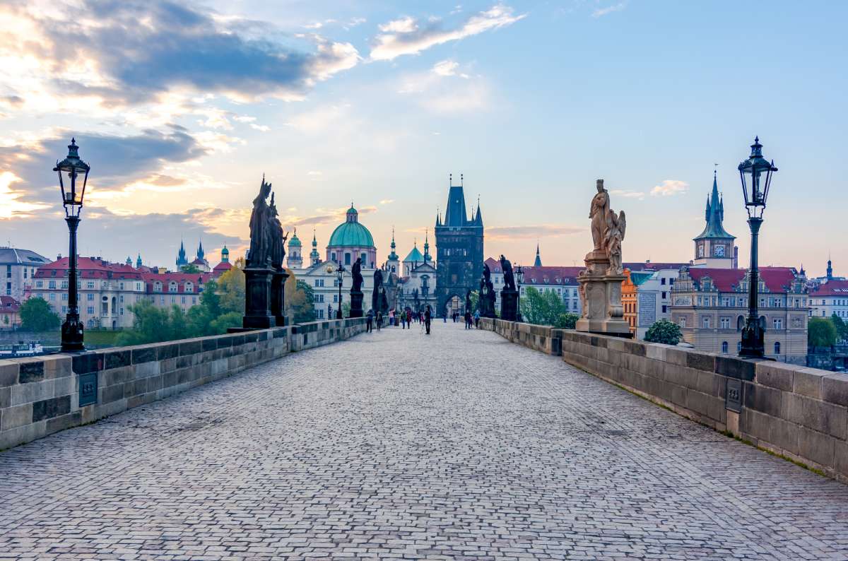 Charles Bridge with statues and Old Town Bridge Tower in Prague, Czech Republic