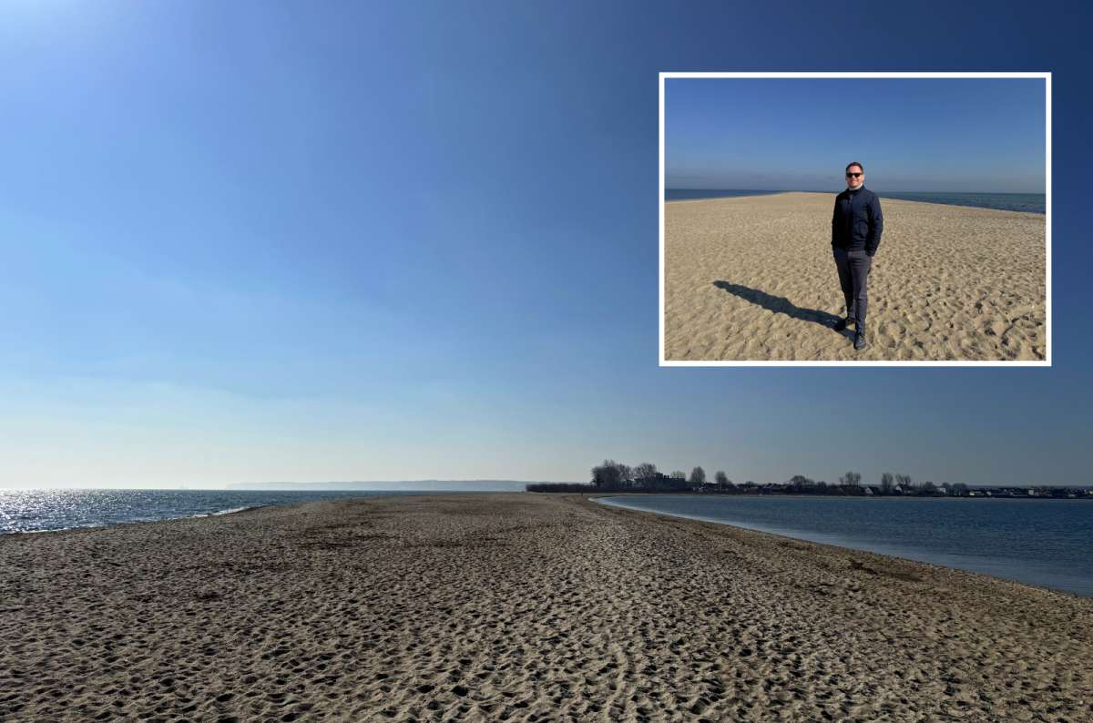 Sandy peninsula of Cypel Rewski stretching into the Baltic Sea near Rewa, Poland, with water on both sides, photo by Next Level of Travel