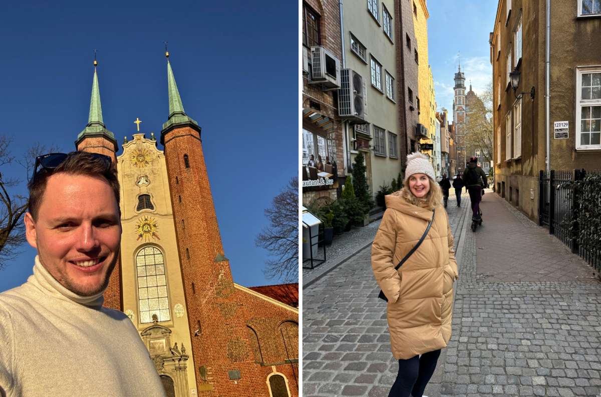 Street view in the Old Town of Gdansk, Poland with historic buildings and St. Mary’s Basilica tower in the background, part of a 2 days in Gdansk itinerary, photo by Next Level of Travel