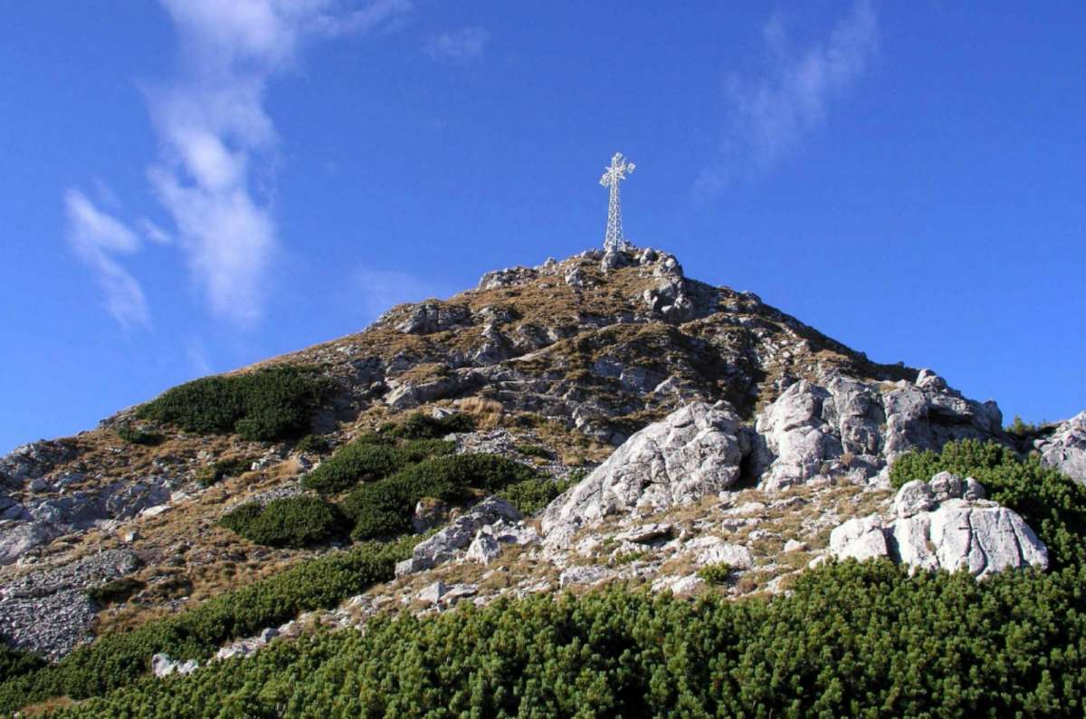 Mountain peak with summit cross above Morskie Oko, Zakopane, Poland
