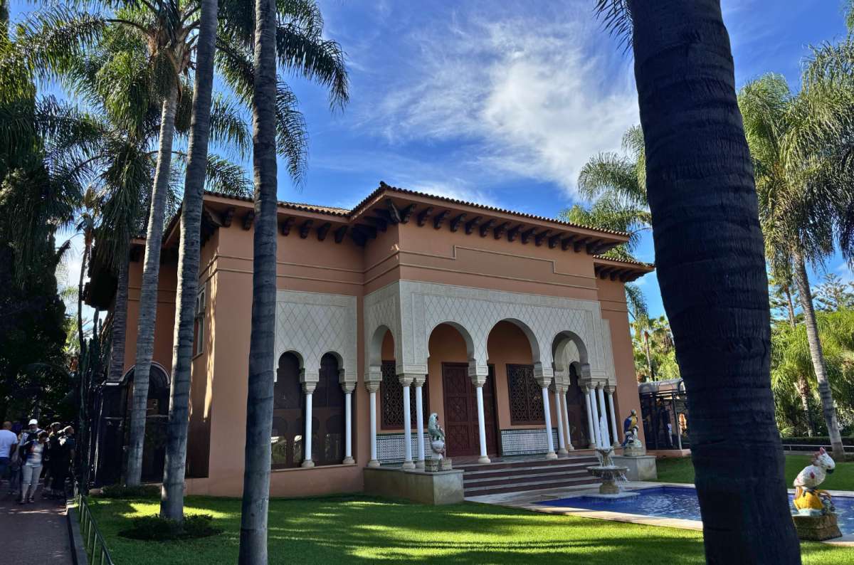 Moorish-style building surrounded by palm trees at Loro Parque, Puerto de la Cruz, Tenerife, Spain, photo by Next Level of Travel