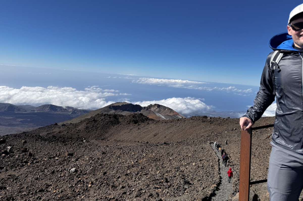 a photo from the top of Mt. Teide with tourists hiking in the background, Canary Islands, photo by Next Level of Travel