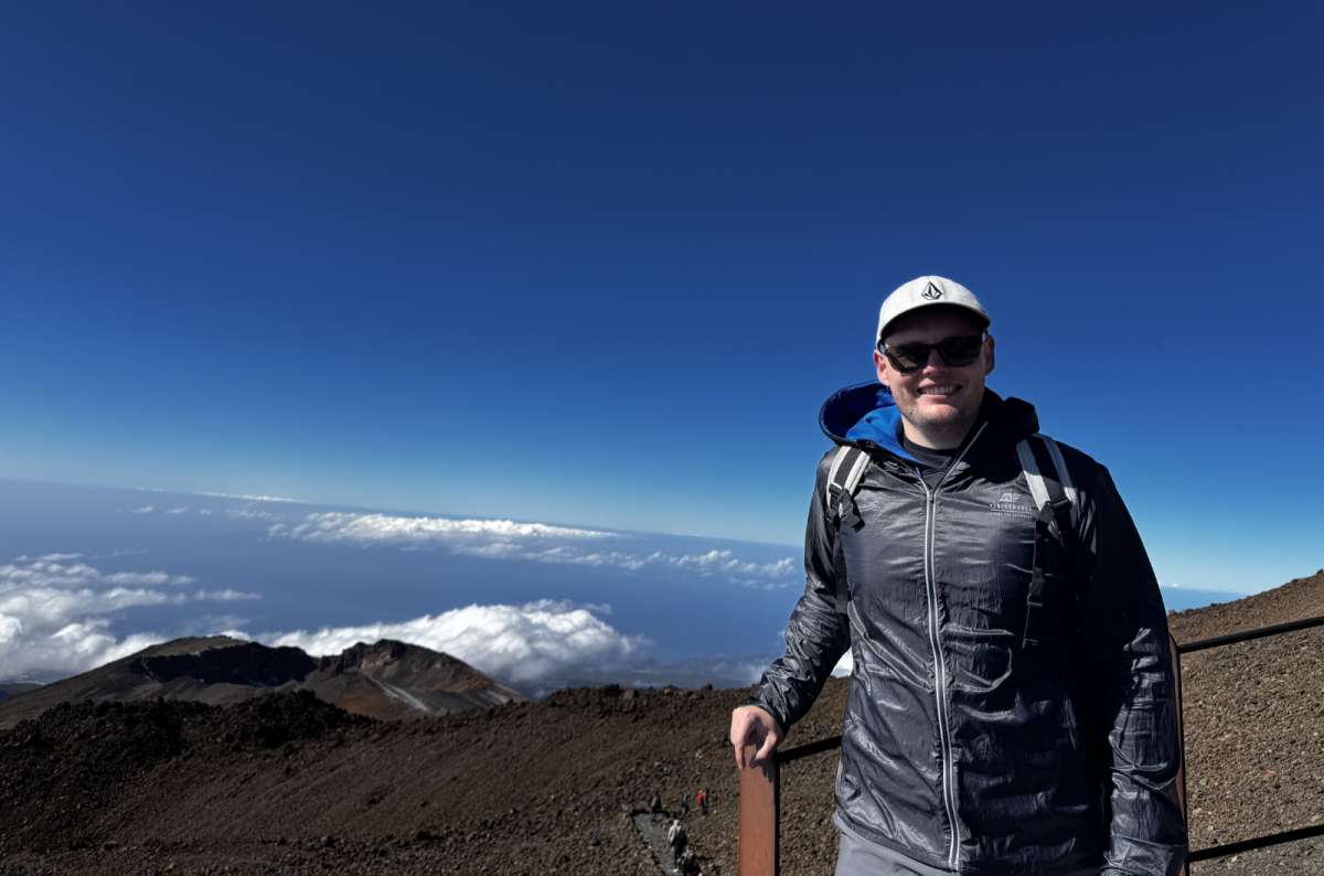 a photo of a tourist posing on the way to the top of the mountain, Canary Islands, photo by Next Level of Travel