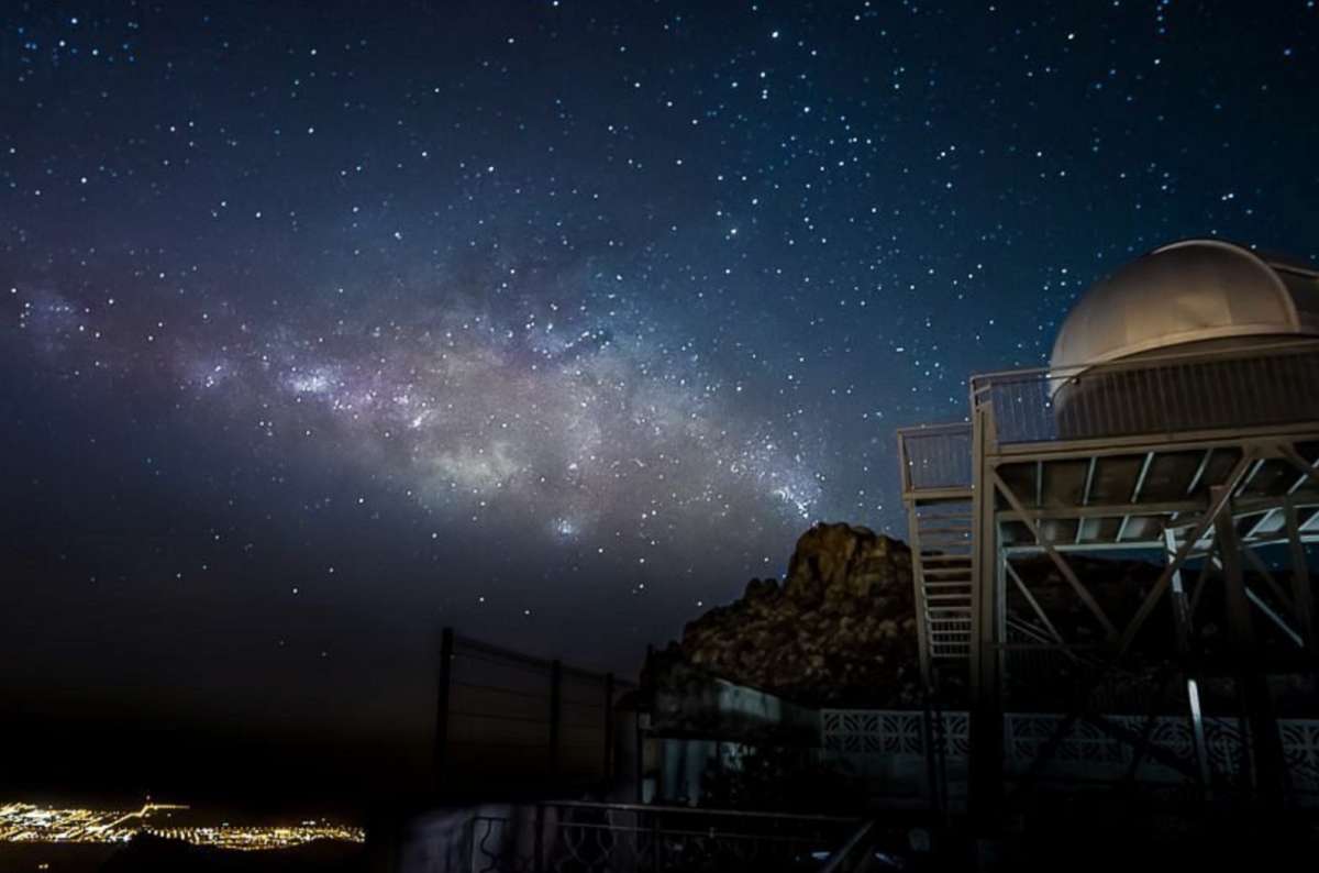 a photo of Mirador Astronomico during the nighttime, with the stars visible in the background, photo by Next Level of Travel