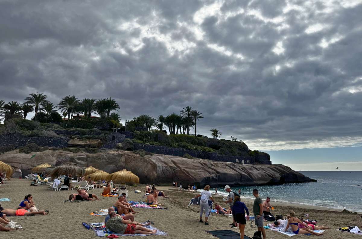  People relaxing on Playa del Duque beach in Costa Adeje, South Tenerife, Spain photo by Next Level of Travel