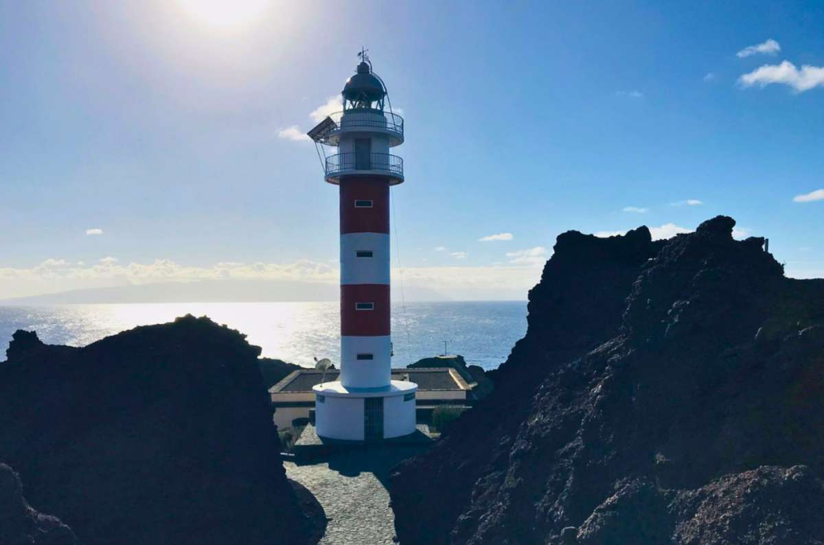 Punta de Teno Lighthouse with volcanic cliffs on Tenerife, Spain