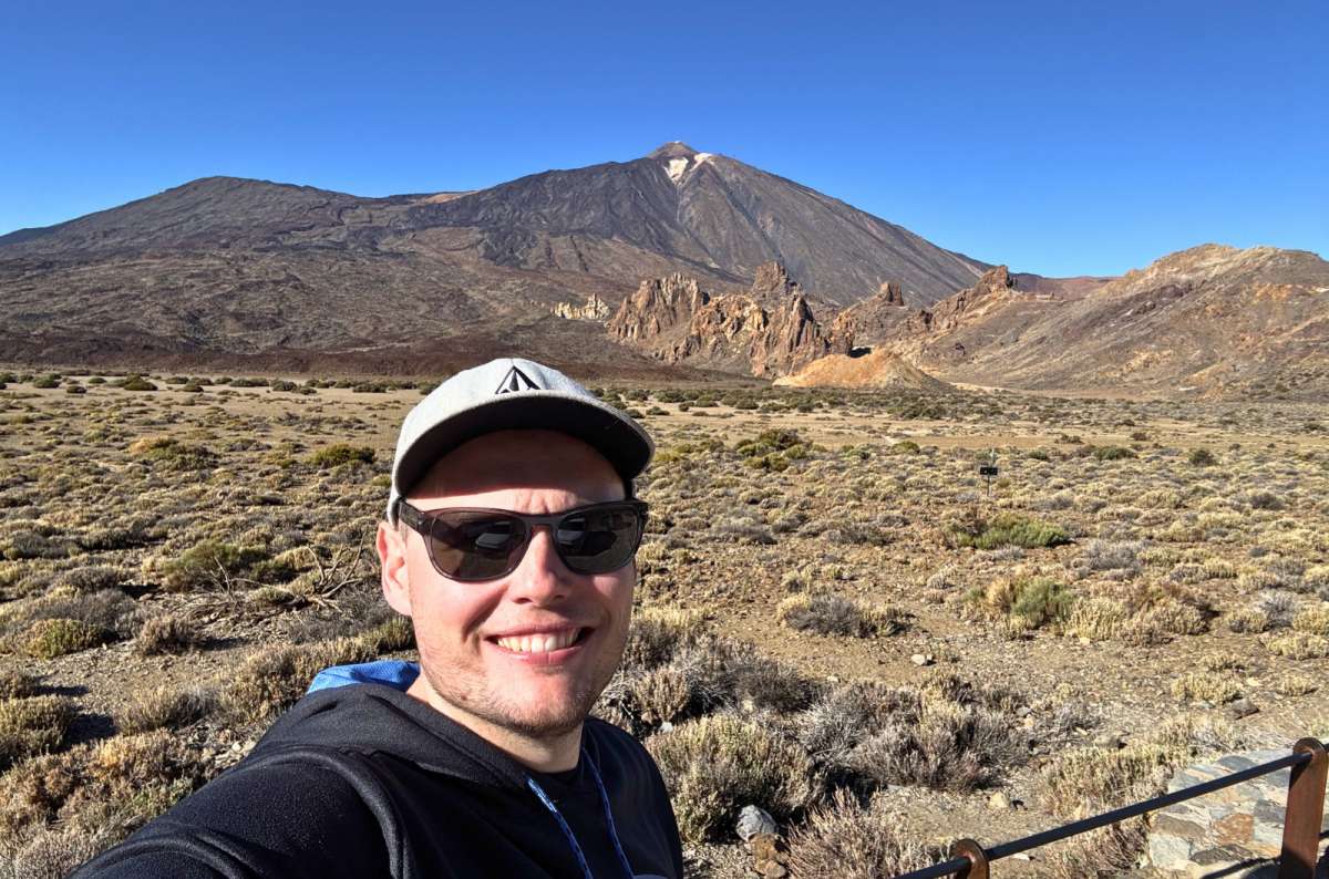 Tourist with Teide volcano in Teide National Park, Tenerife, Spain photo by Next Level of Travel