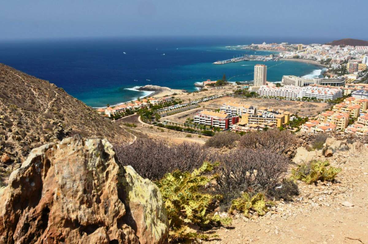 View over Los Cristianos and coastline from above in Tenerife, Spain