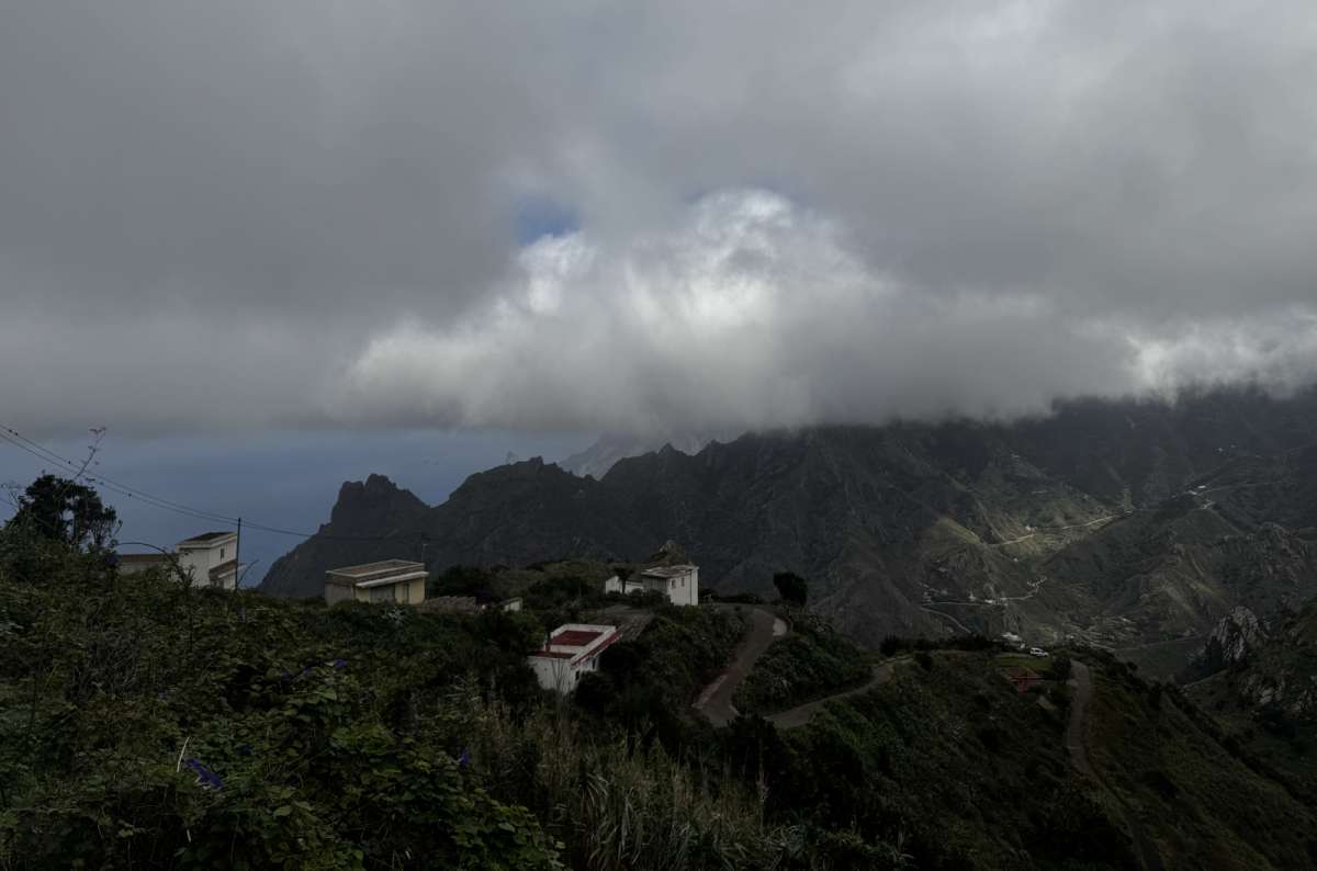 a photo from Anaga Rural Park, showing the mountain peaks covered in grey clouds, Canary Islands, photo by Next Level of Travel
