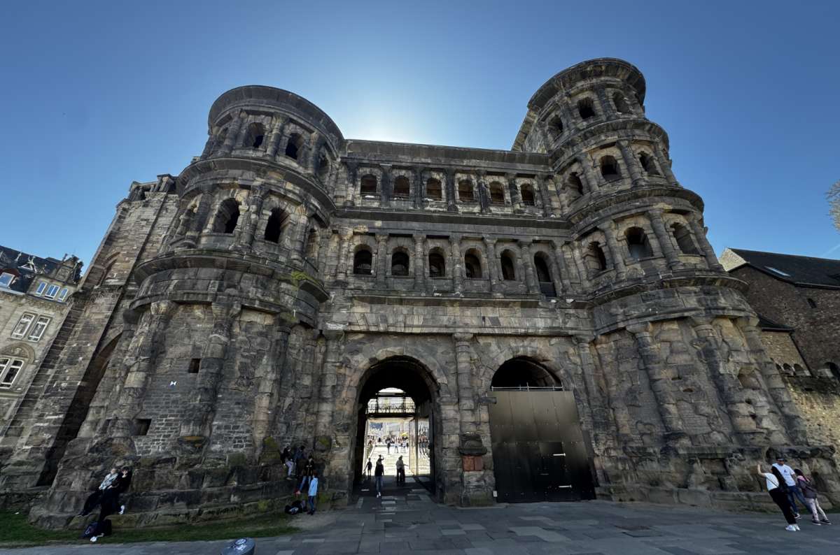 a photo of Porta Nigra, showing the size and stone details of the gate, Trier, Germany, photo by Next Level of Travel