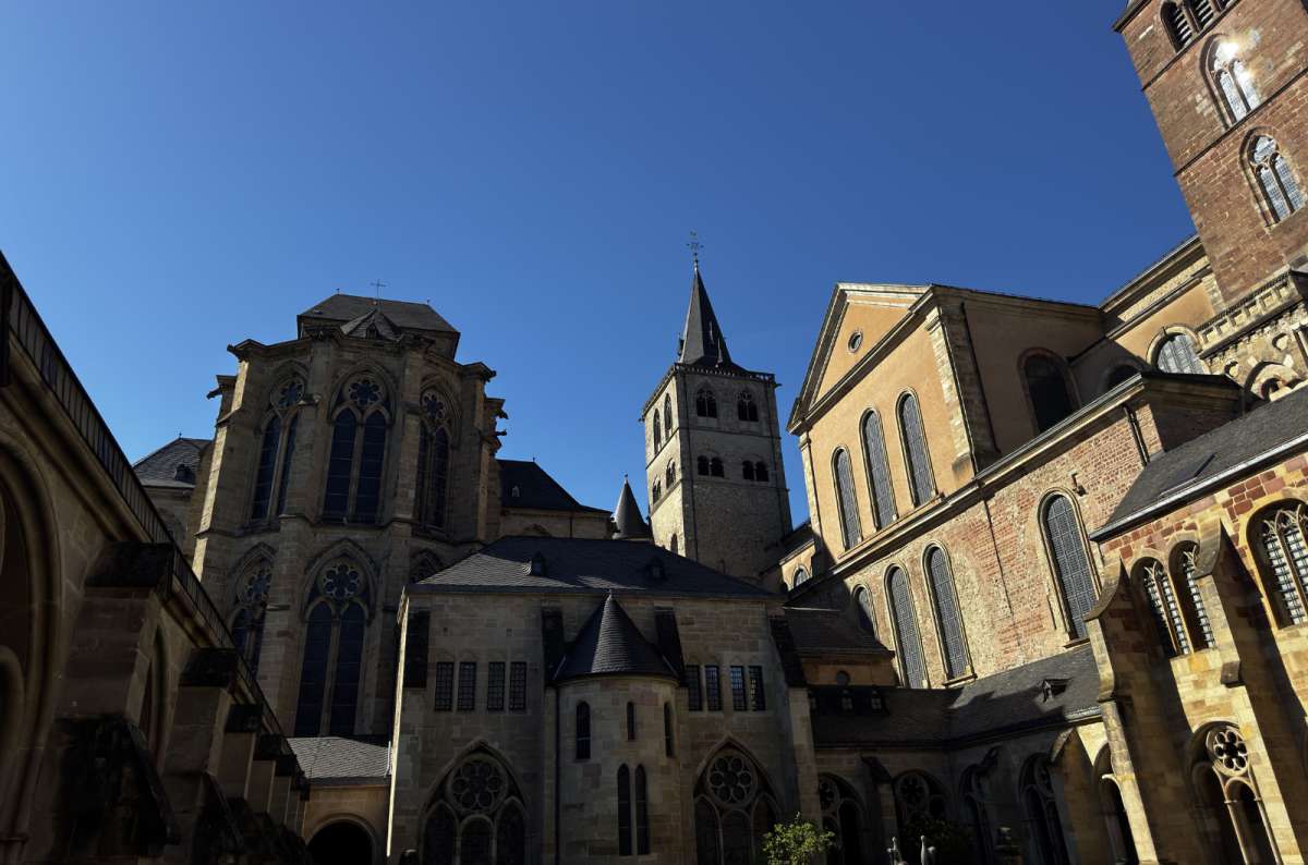 a photo of the outside of the Trier Cathedral showing its intricate architecture, Trier, Germany, photo by Next Level of Travel