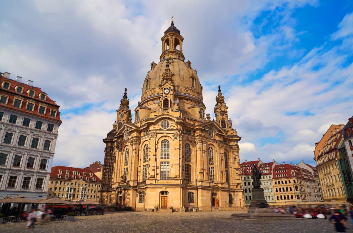 : a photo of the Frauenkirche and the surrounding old town square in Dresden, Germany