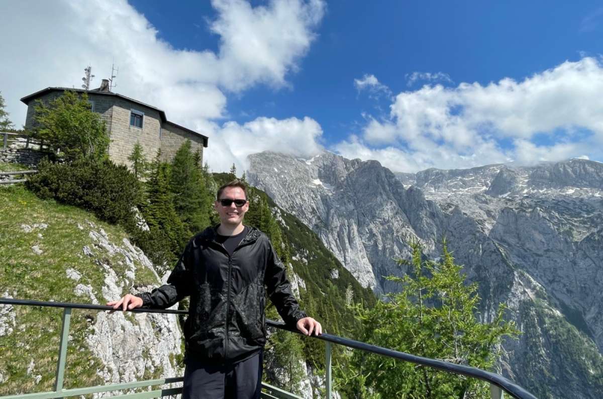 a collage of a tourist posing in front of the infamous Hitler’s Eagle’s Nest, Germany, photo by Next Level of Travel