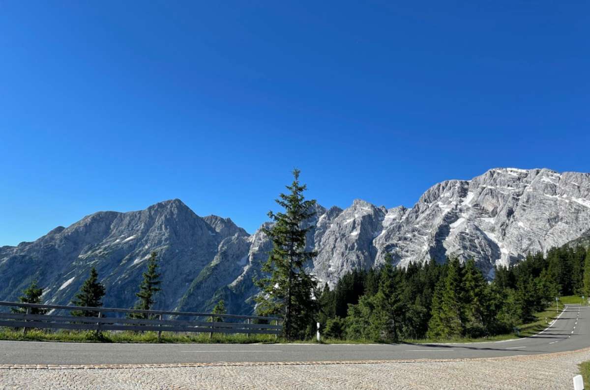 a photo of the alpine road in Berchtesgaden, showing the beautiful nature in the background, Germany, photo by Next Level of Travel