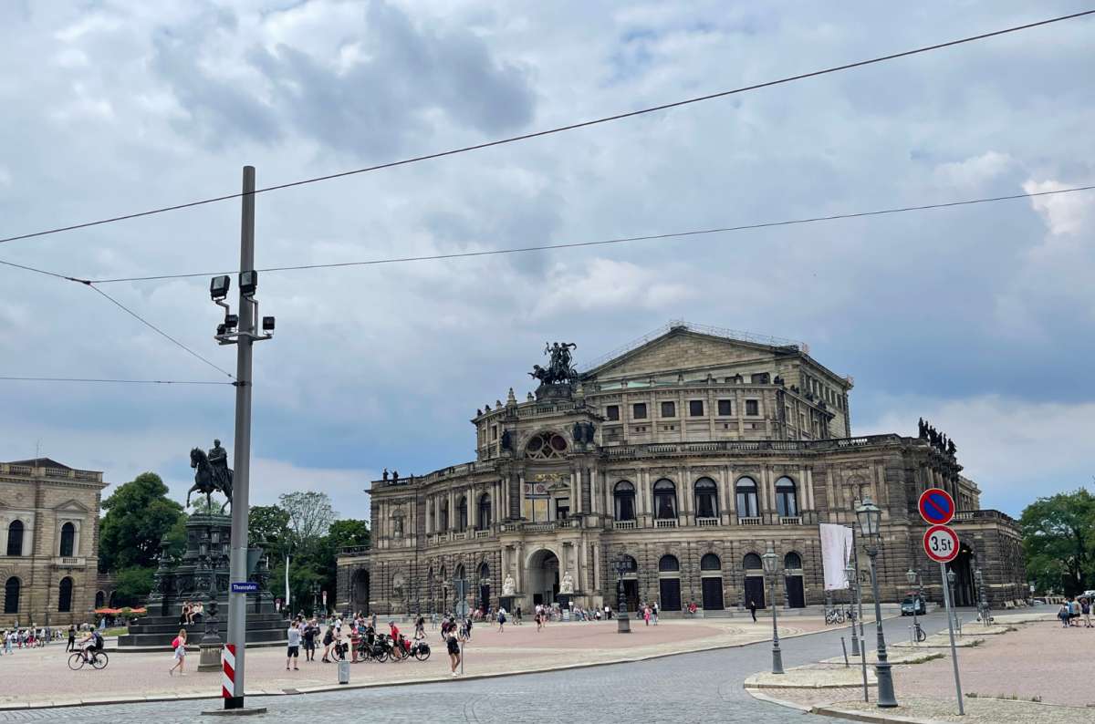 a photo of the Semperoper opera house and Theaterplatz in Dresden, Germany, photo by Next Level of Travel