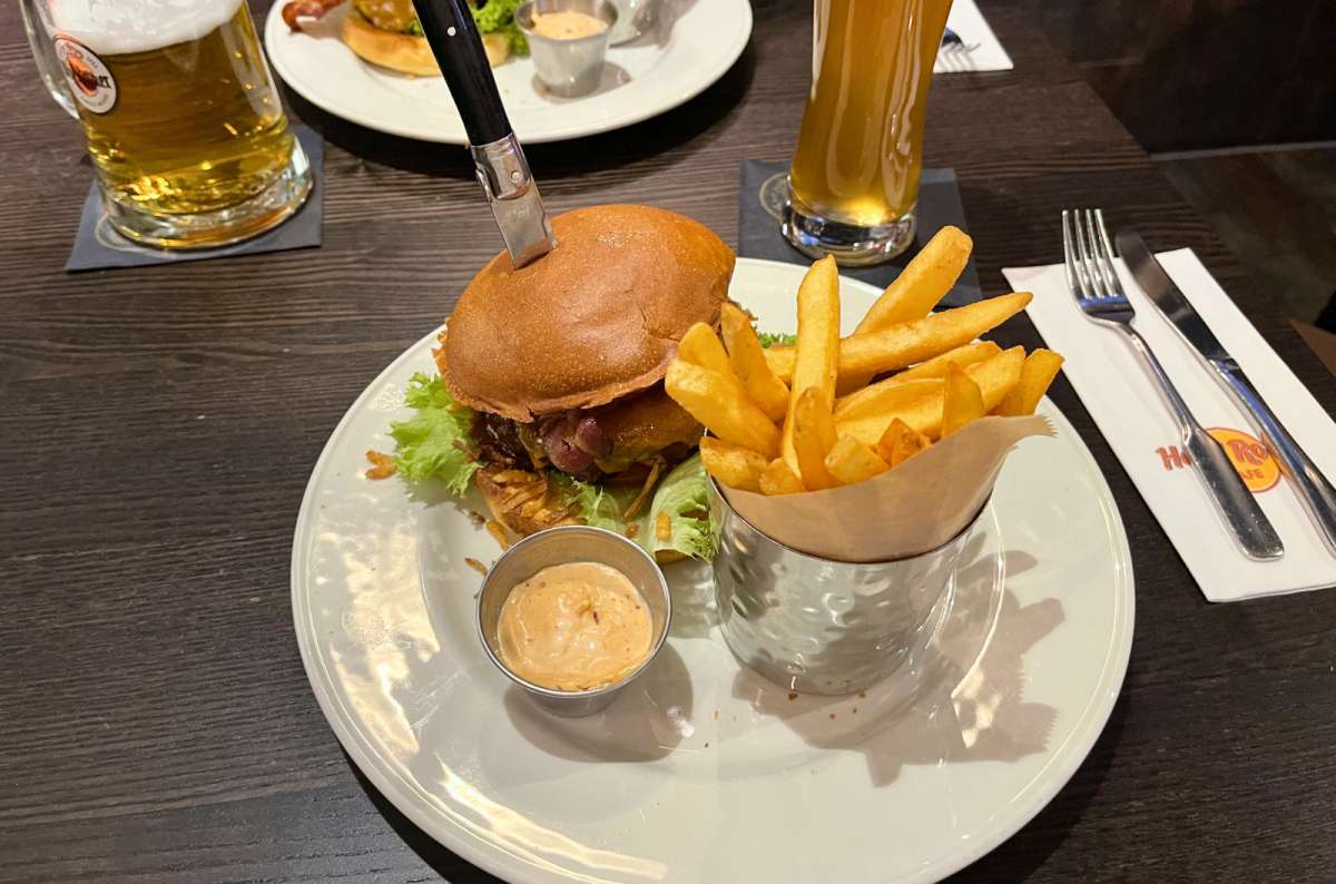  German restaurant meal with beef cheeks, ribs, sweet potato fries, and beer in Germany, photo by Next Level of Travel