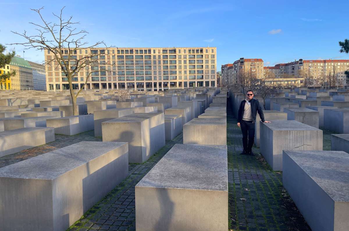 Tourist at the Memorial to the Murdered Jews of Europe in Berlin, Germany, photo by Next Level of Travel