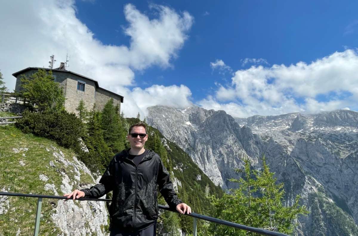 Tourist overlooking the Berchtesgaden Alps near Berchtesgaden National Park, Germany, photo by Next Level of Travel