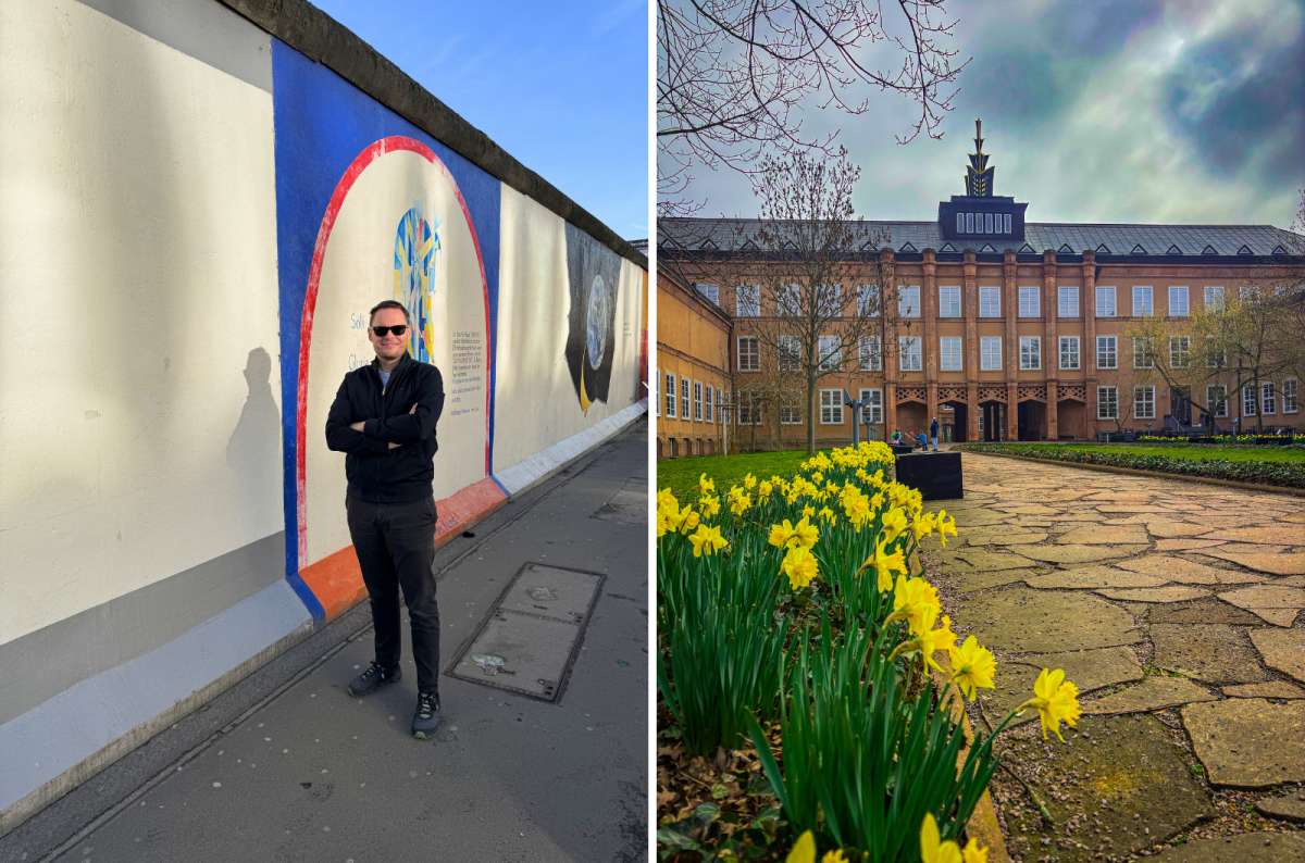 Visitor standing by a remaining section of the Berlin Wall and spring flowers outside the Stasi Records Archive in Leipzig, Germany, photo by Next Level of Travel