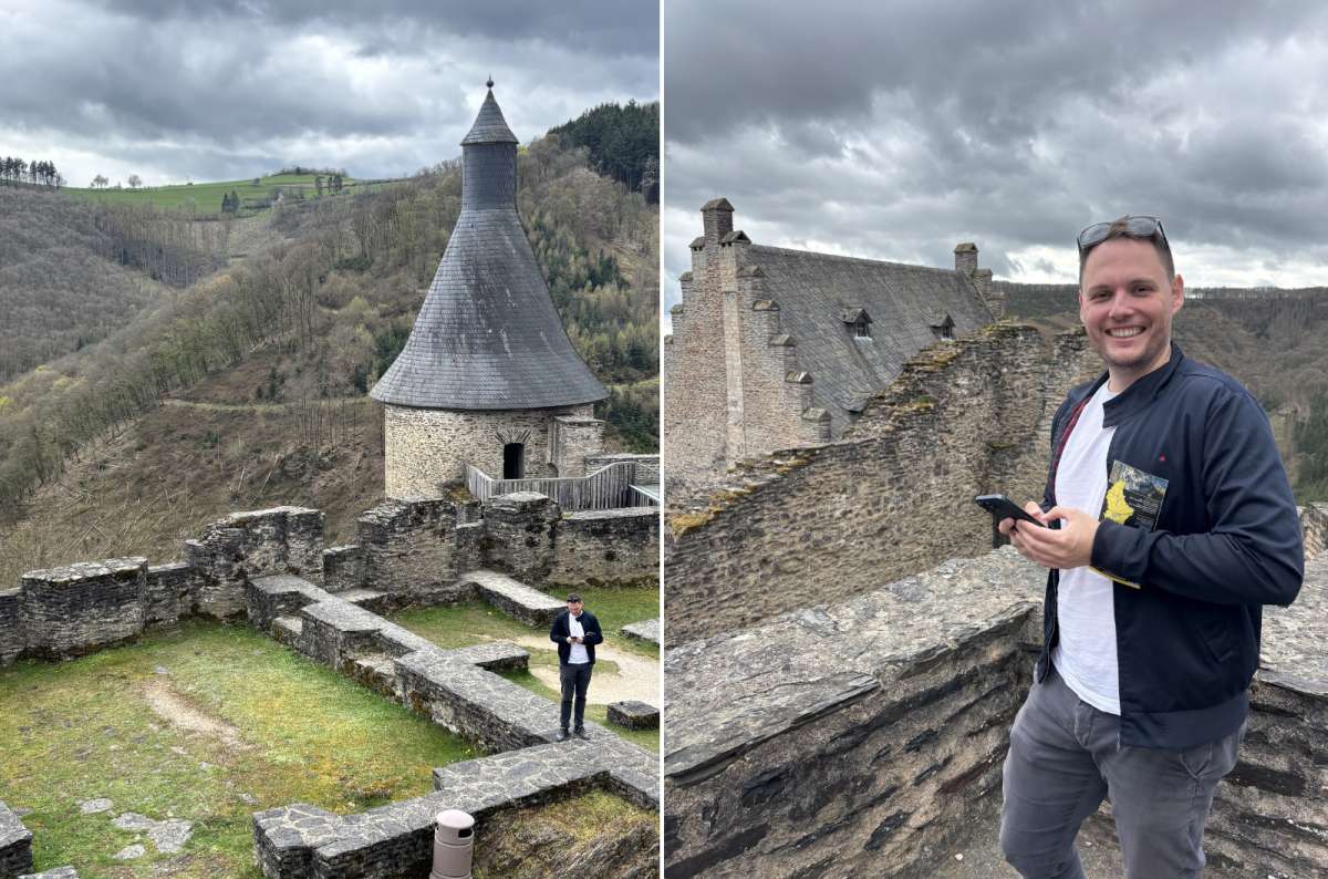 Tourist on the ramparts of Vianden Castle, Vianden, Luxembourg, photo by Next Level of Travel