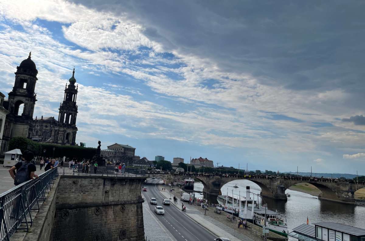 a photo from Brühl’s Terrace showing the view of the city and the bridge going across the river, Dresden, Germany, photo by Next Level of Travel