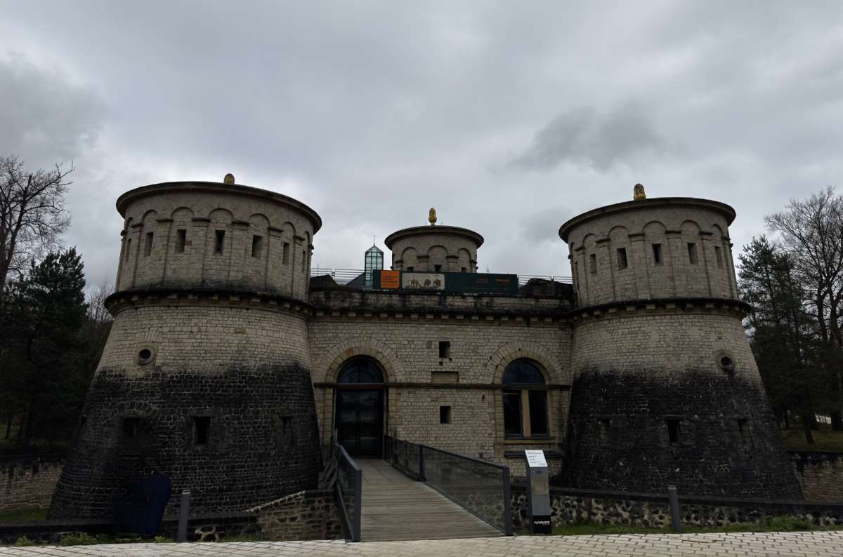 a photo of the Dräi Eechelen from the front, showing the three towers and the main entrance to the fortress, Luxembourg, photo by Next Level of Travel